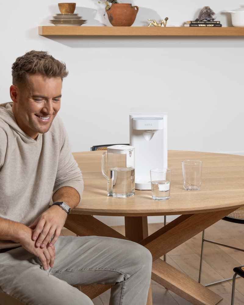 Sans water purifier on kitchen counter